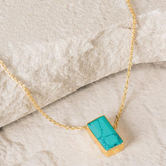 Turquoise Necklace - Finely handcrafted gold chain necklace that flows naturally into a Turquoise gemstone.